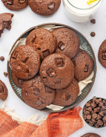 Overhead view of double chocolate chip cookies piled on plate