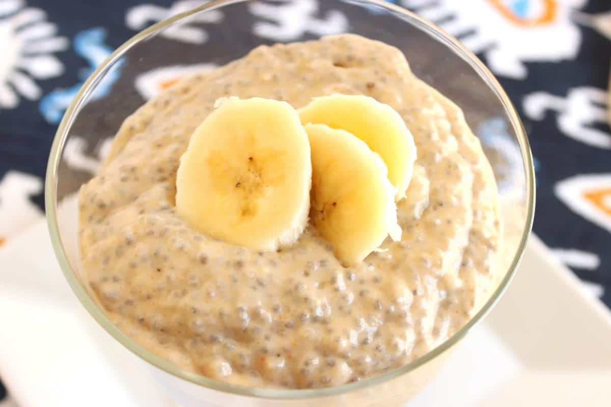 chia pudding in a dessert bowl topped with sliced bananas