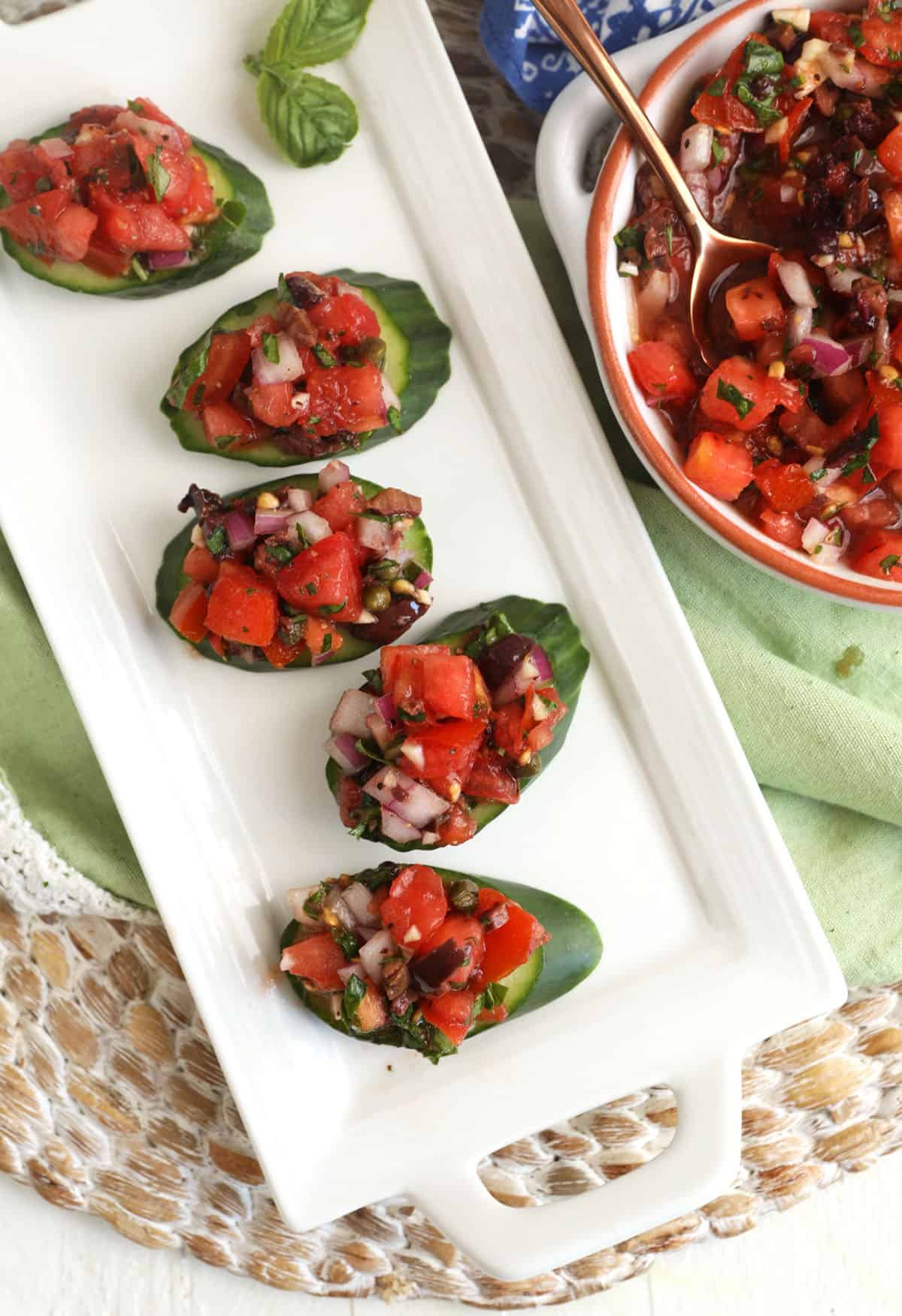 Platter with cucumber bruschetta