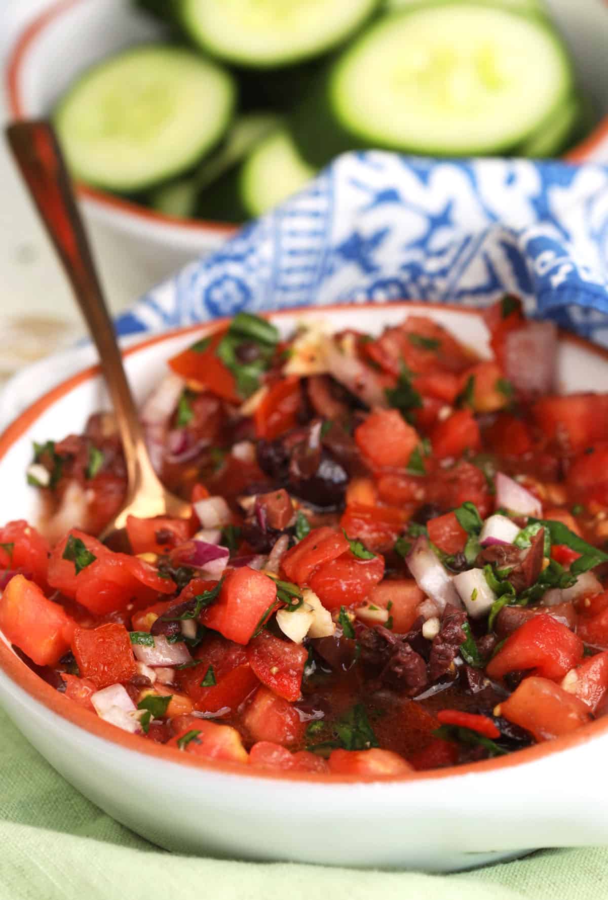 Bowl of cucumber bruschetta topping