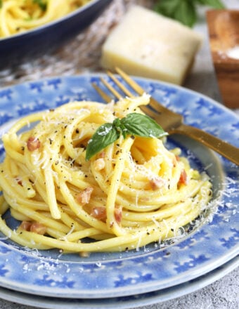 Pasta carbonara in bowl with fork