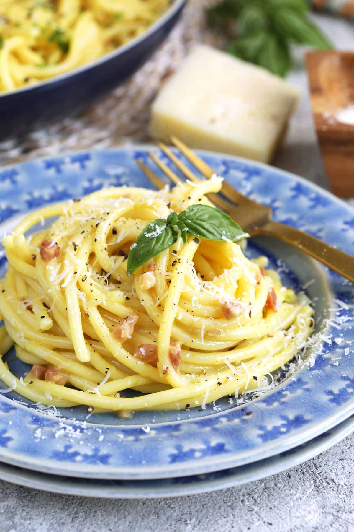 Pasta carbonara in bowl with fork