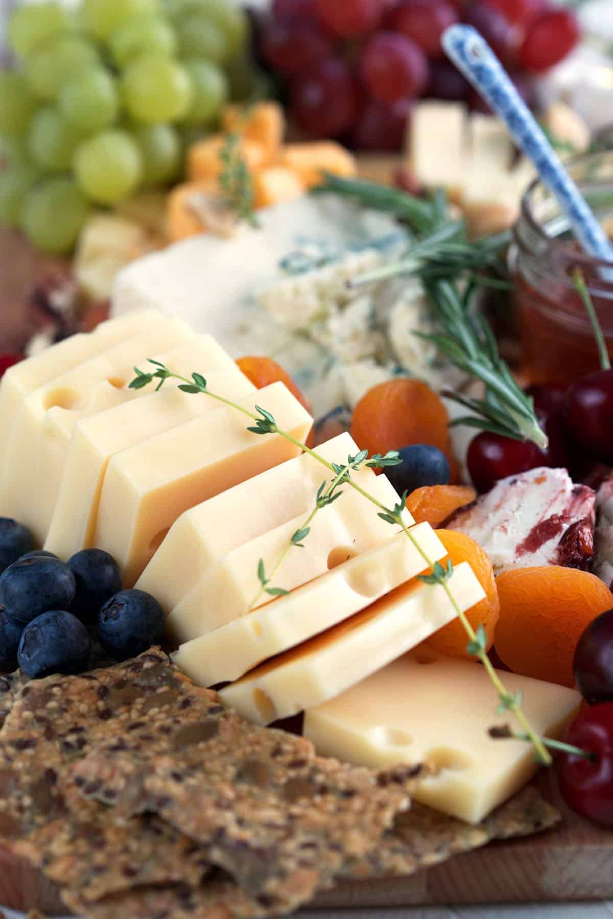 Closeup of cheese on cheese board