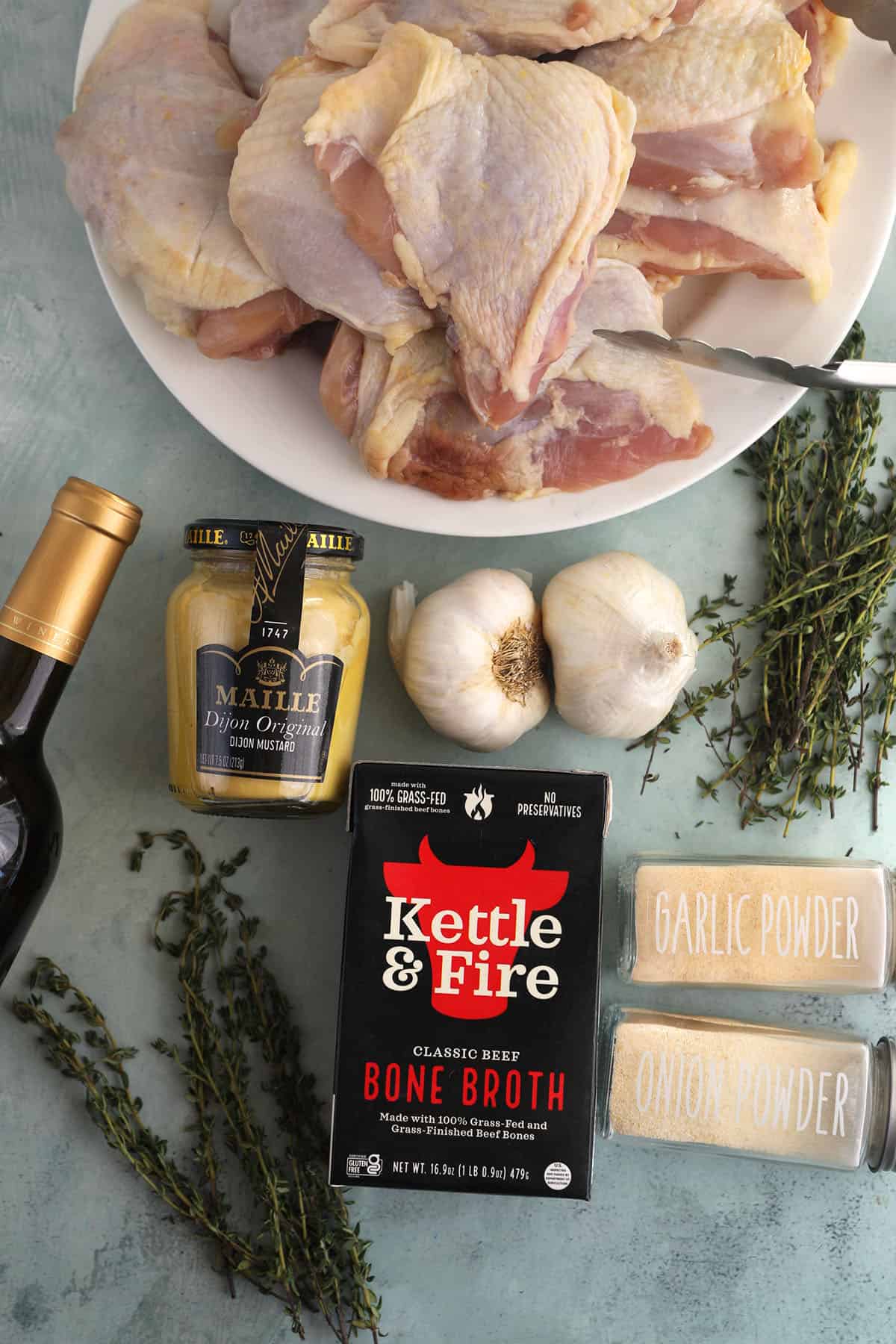 Ingredients for braised chicken thighs with garlic.