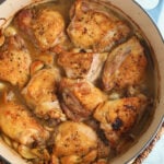 Braised chicken thighs in a dutch oven.