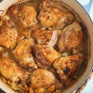 Braised chicken thighs in a dutch oven.