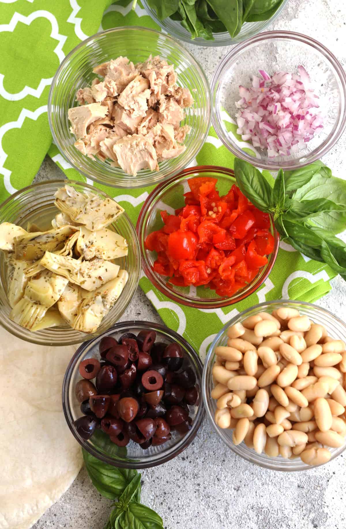 Overhead view of ingredients for Mediterranean tuna wrap