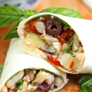 Mediterranean tuna wrap, sliced in half and stacked