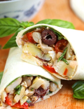 Mediterranean tuna wrap, sliced in half and stacked