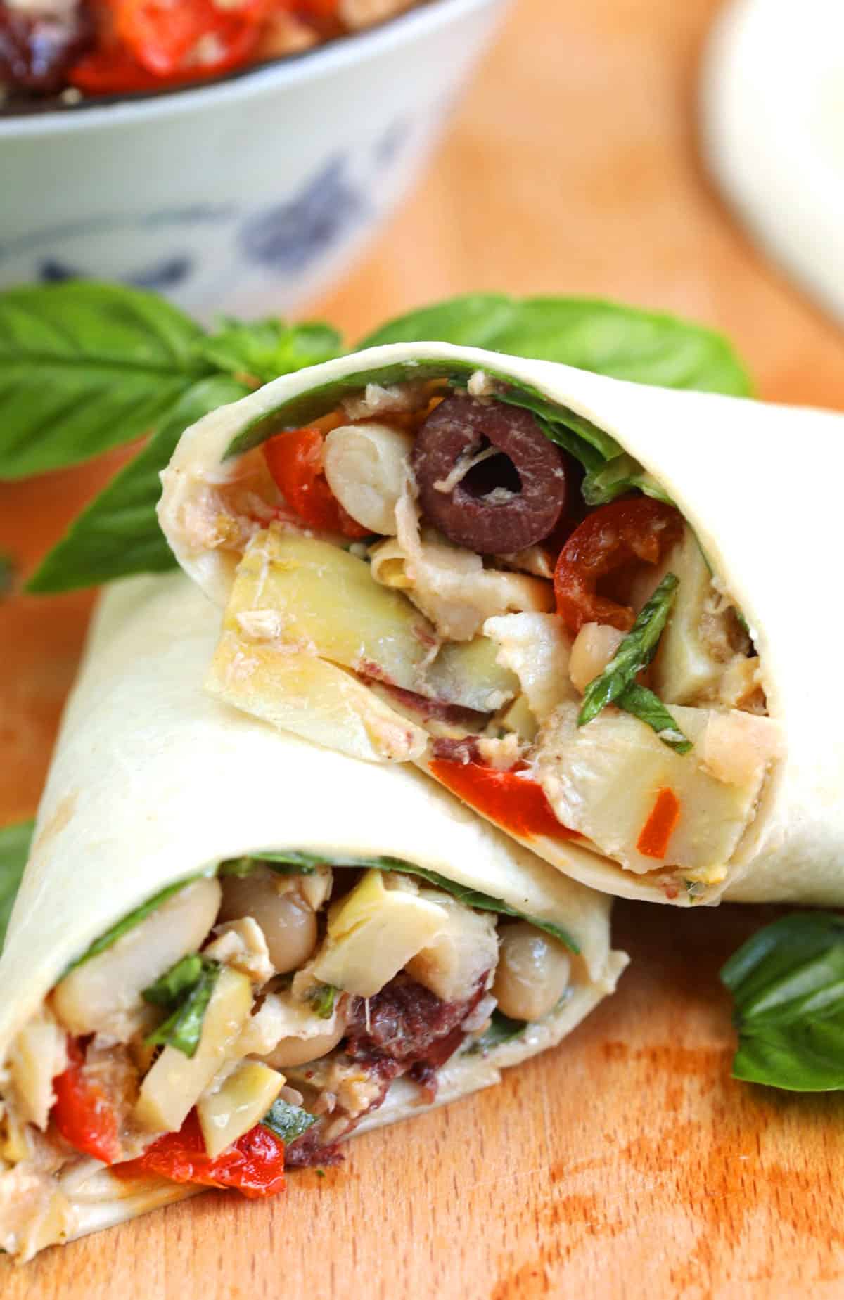 Mediterranean tuna wrap, sliced in half and stacked