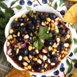 Overhead view of blueberry corn salsa in serving bowl