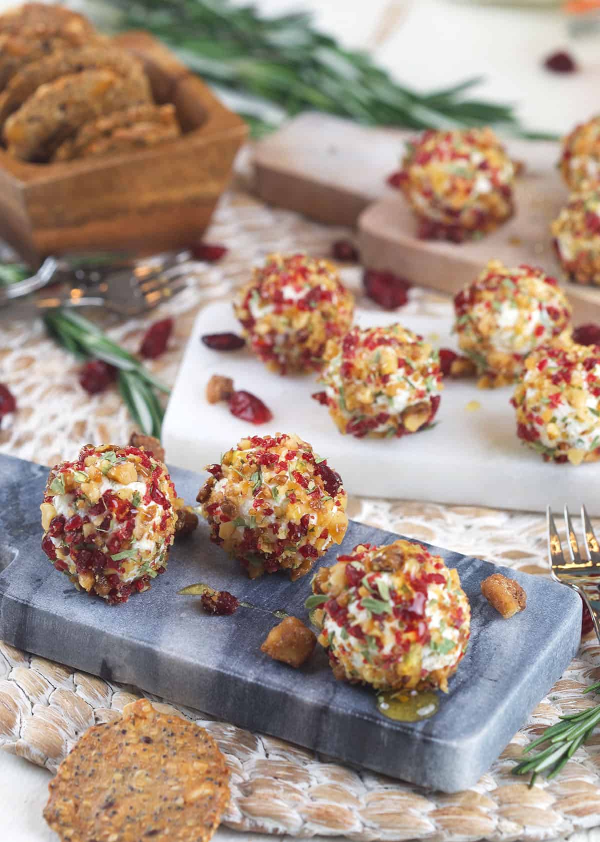 Goat cheese balls on serving platters