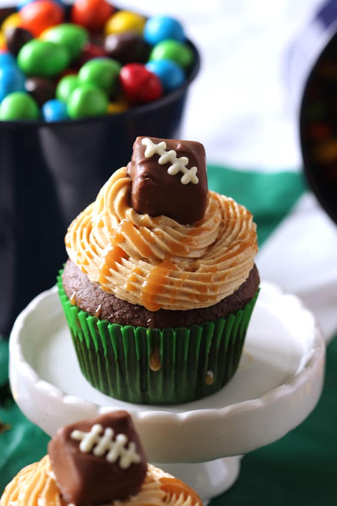 Snickers Cupcakes with Peanut Butter Frosting | TheSuburbanSoapbox.com #SweetenTheSpread