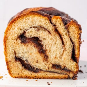 Sliced chocolate babka on cutting board