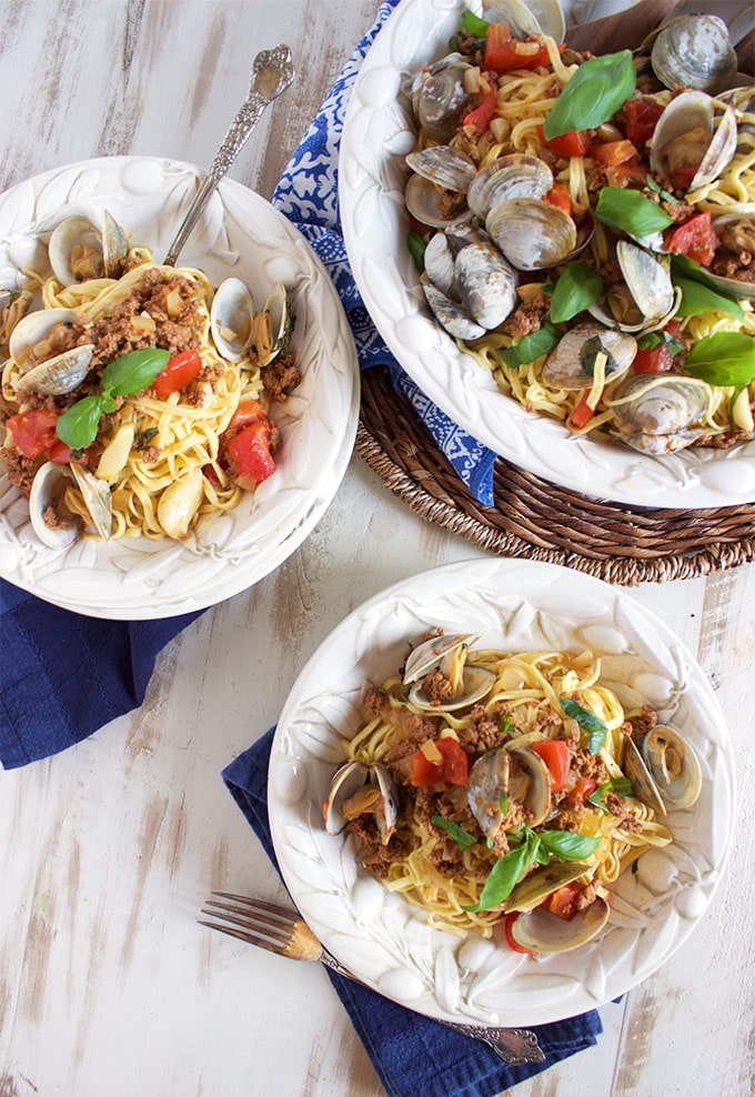 This easy Linguine with Clams Chorizo and Roasted Tomatoes is loaded with flavor and is ready in about 30 minutes. From TheSuburbanSoapbox.com