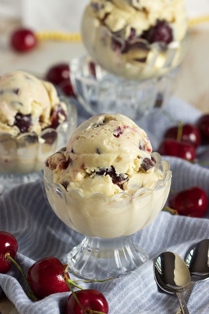 Creamy, rich ice cream recipe studded with fresh cherries and chocolate chunks from The Suburban Soapbox.