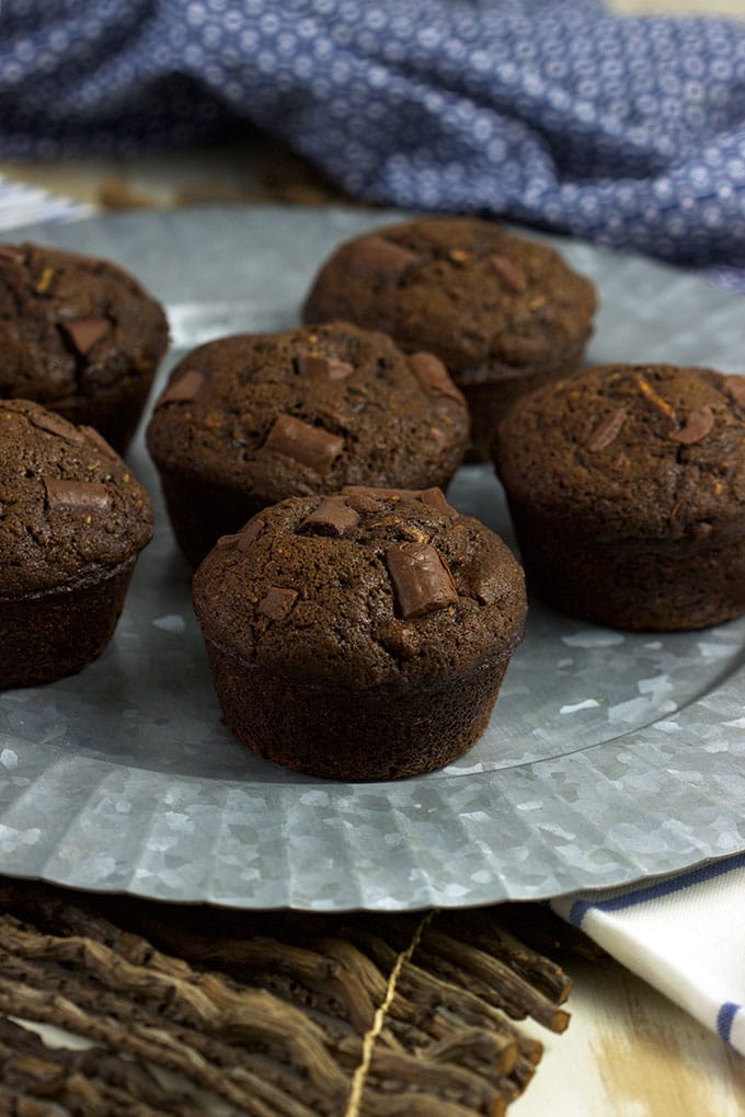 Rich, moist chocolate Double Chocolate Zucchini Muffin recipe is perfect for any occasion from TheSuburbanSoapbox.com.