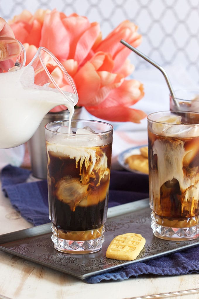 Super easy Starbucks Inspired Iced Coconut Caramel Macchiato recipe is refreshing and cool. TheSuburbanSoapbox.com
