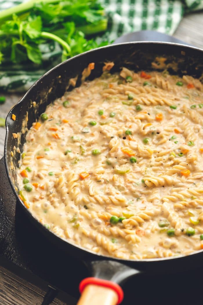 tuna casserole in a skillet with noodles.