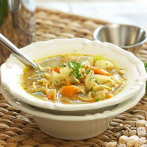 The Best Chicken Noodle Soup recipe ever, perfect for crisp fall nights! | TheSuburbanSoapbox.com