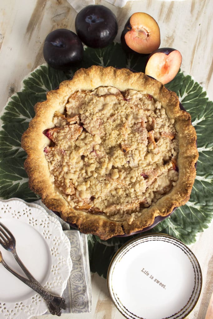 This super easy Streusel Plum Pie recipe is like a sweet plum crisp nestled in a buttery pie crust. Perfection from TheSuburbanSoapbox.com.