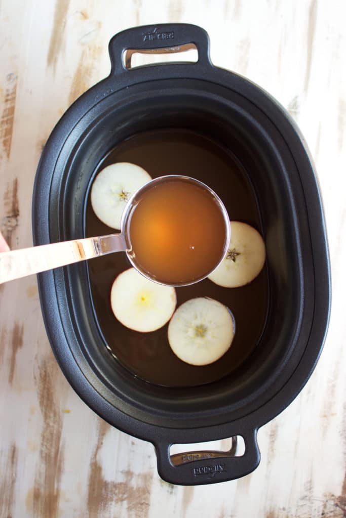 Super easy to make at home, this Slow Cooker Apple Cider recipe is the best around. Simple and fresh. TheSuburbanSoapbox.com