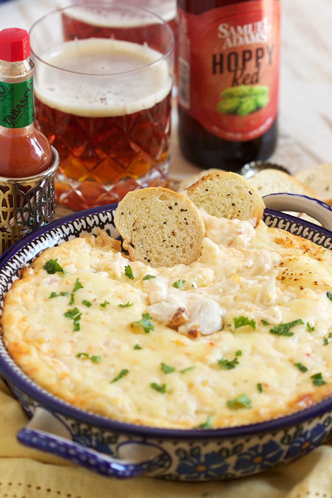 Super easy to make and perfect for any party, this is the BEST Hot Crab Dip recipe ever. | TheSuburbanSoapbox.com
