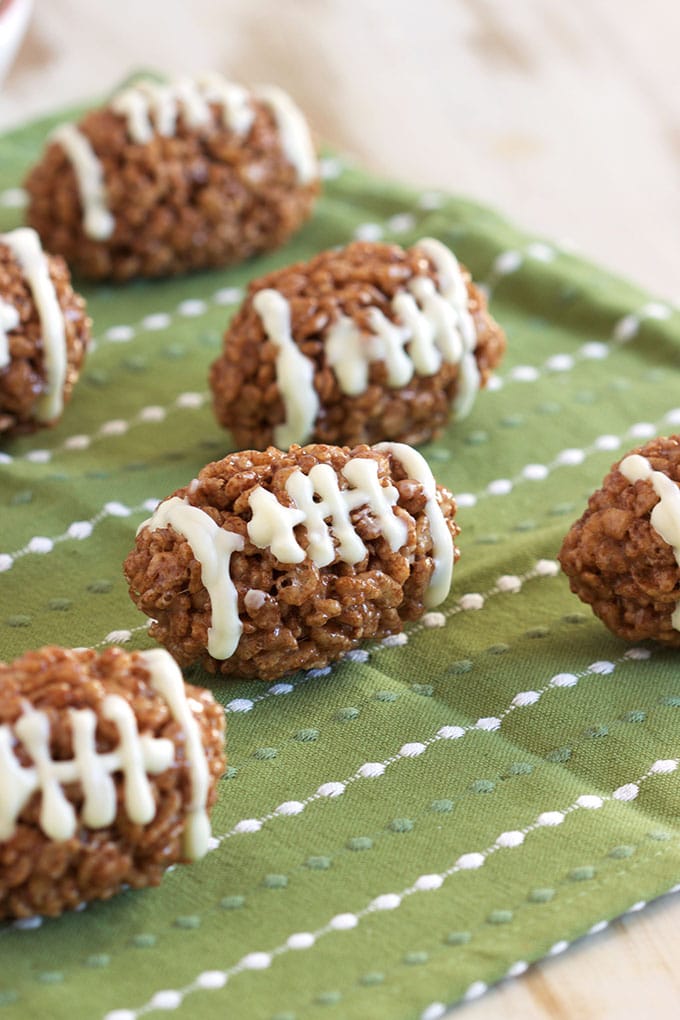 Super easy to make Rice Krispie Footballs, fun for any football or tailgating party. TheSuburbanSoapbox.com