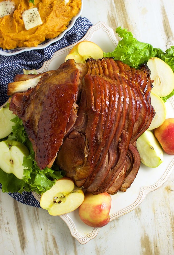 So easy to make, this Bourbon Honey Baked Ham recipe is better than the original and perfect for any holiday! | TheSuburbanSoapbox.com
