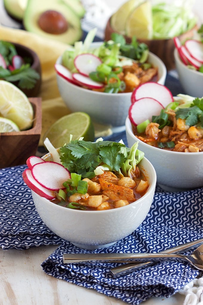 Super easy to make Pork Posole recipe is the BEST, most flavorful stew ever! TheSuburbanSoapbox.com