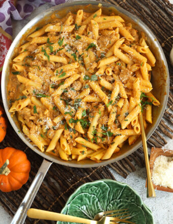 Overhead view of pumpkin pasta in skillet