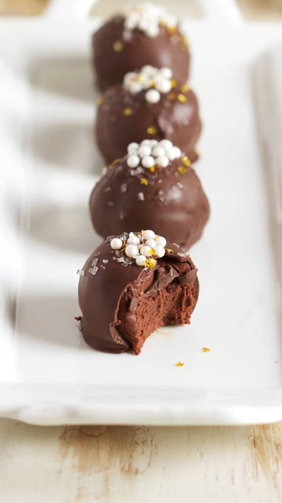 Super easy to make Dark Chocolate Champagne Truffles are the perfect way to use up your leftover champagne. | TheSuburbanSoapbox.com