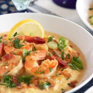 Super easy and ready in minutes, this Cheesy Shrimp and Grits recipe is the BEST ever! | TheSuburbanSoapbox.com