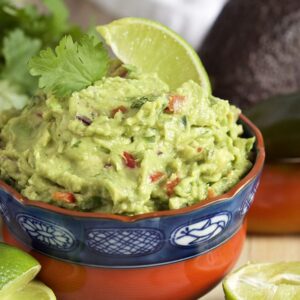 Super easy to make, this is the Very BEST Guacamole recipe ever. A must for game day. | TheSuburbanSoapbox.com