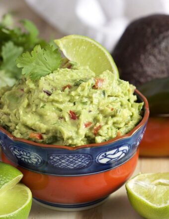 Super easy to make, this is the Very BEST Guacamole recipe ever. A must for game day. | TheSuburbanSoapbox.com