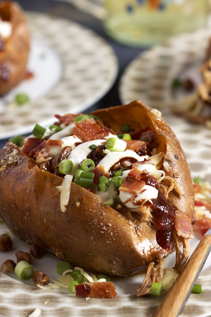 Super easy to make Loaded Pulled Pork Stuffed Sweet Potatoes are a quick easy weeknight dinner solution! | TheSuburbanSoapbox.com