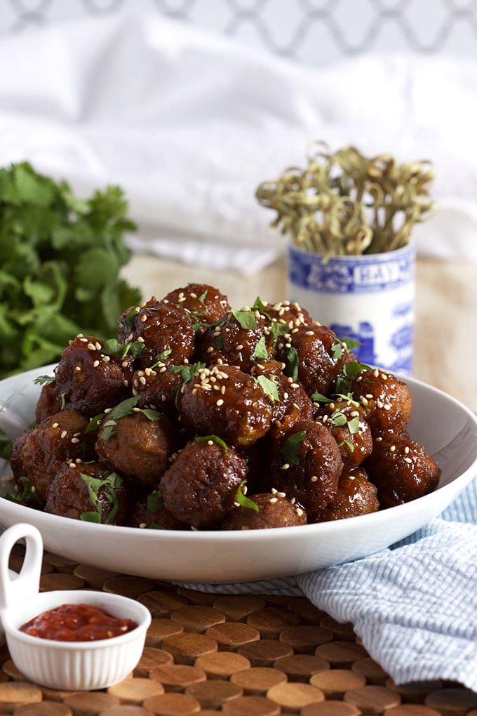 Super easy to make Slow Cooker Spicy Orange Marmalade Meatballs recipe is the perfect addition to any game day spread! | TheSuburbanSoapbox.com
