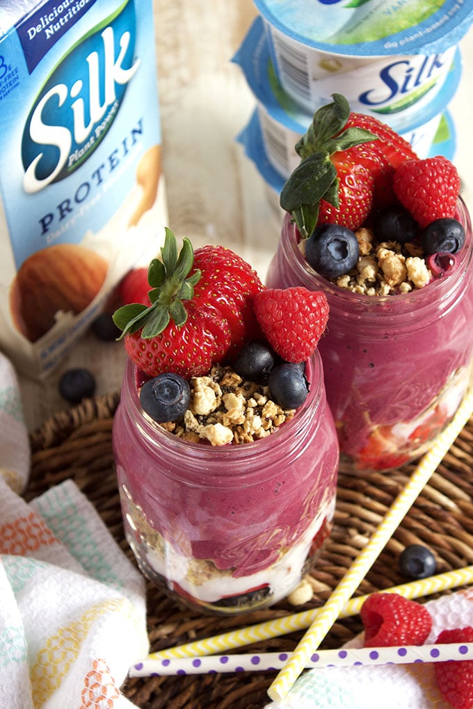 Easy to make and perfect for breakfast on the go, this Triple Berry Smoothie Snack Jar is healthy and hearty. | TheSuburbanSoapbox.com