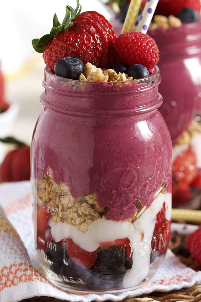 Easy to make and perfect for breakfast on the go, this Triple Berry Smoothie Snack Jar is healthy and hearty. | TheSuburbanSoapbox.com