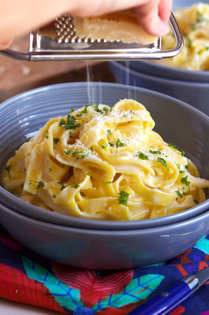 Quick and easy, the best Fettuccine Alfredo recipe that's better than take out and made in your own kitchen. | TheSuburbanSoapbox.com