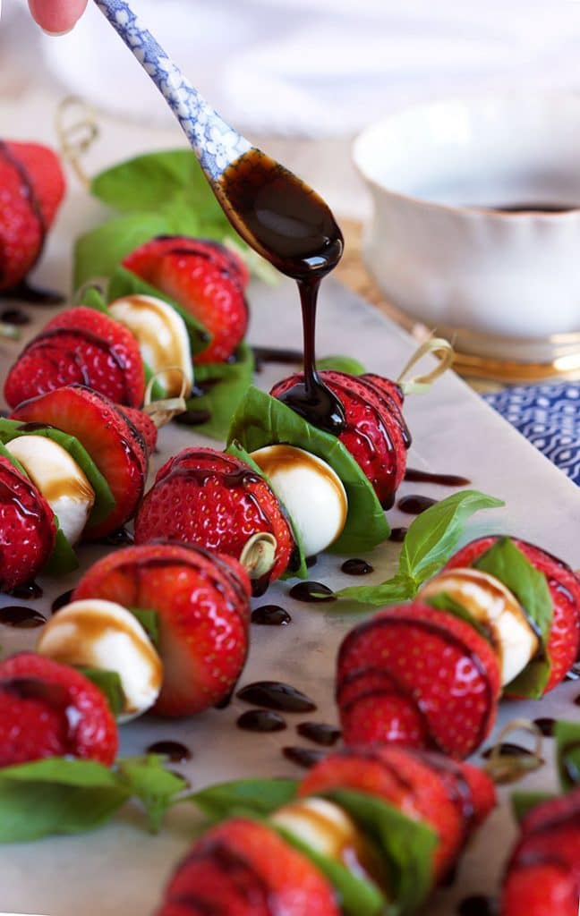 Ready in minutes, Strawberry Caprese Salad Skewers are the perfect party appetizer recipe for spring and summer. | TheSuburbanSoapbox.com