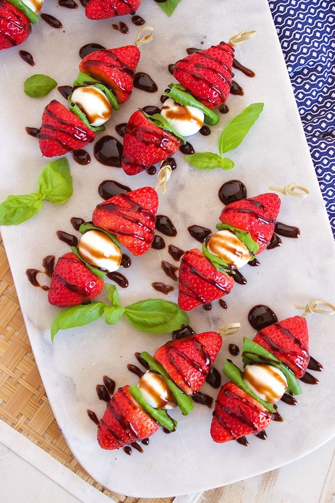 Ready in minutes, Strawberry Caprese Salad Skewers are the perfect party appetizer recipe for spring and summer. | TheSuburbanSoapbox.com