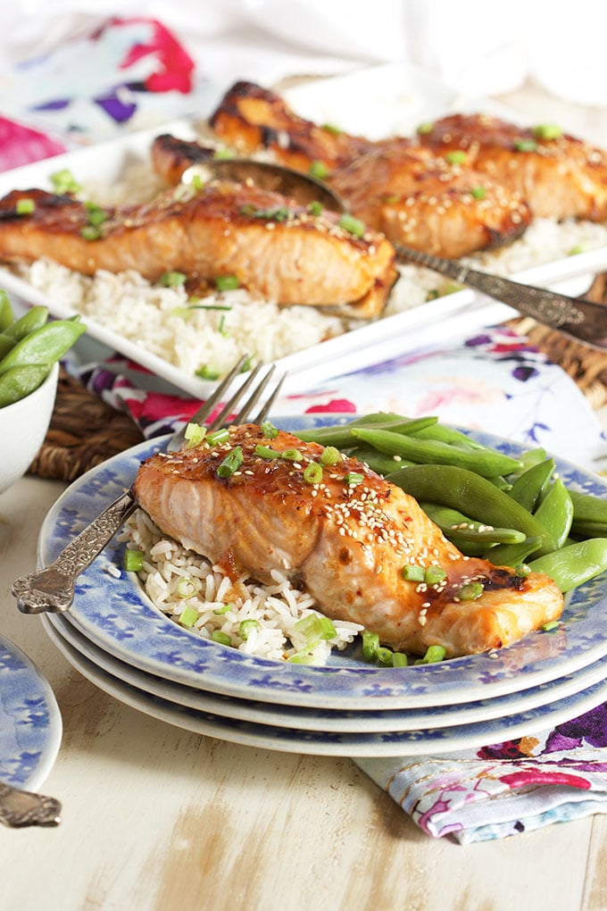 Easy to make and ready in 15 minutes, this Sweet Chili Orange Glazed Salmon recipe is a family favorite. | TheSuburbanSoapbox.com