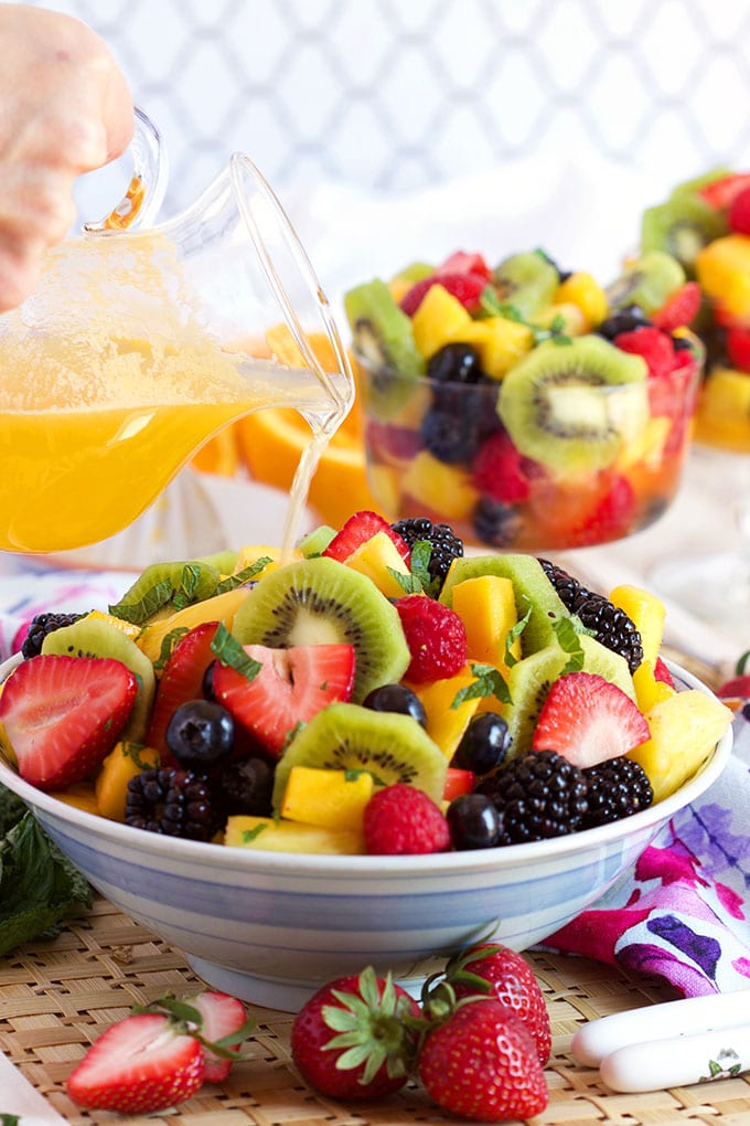 The most festive and refreshing dish ever, Sparkling Fruit Salad with Champagne Mimosa Dressing is fantastic for brunch, breakfast or just a summer day. | TheSuburbanSoapbox.com