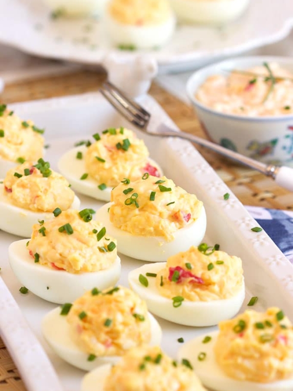 Easy to make Pimento Cheese Deviled Eggs recipe is the perfect addition to any spring or summer party menu. | TheSuburbanSoapbox.com
