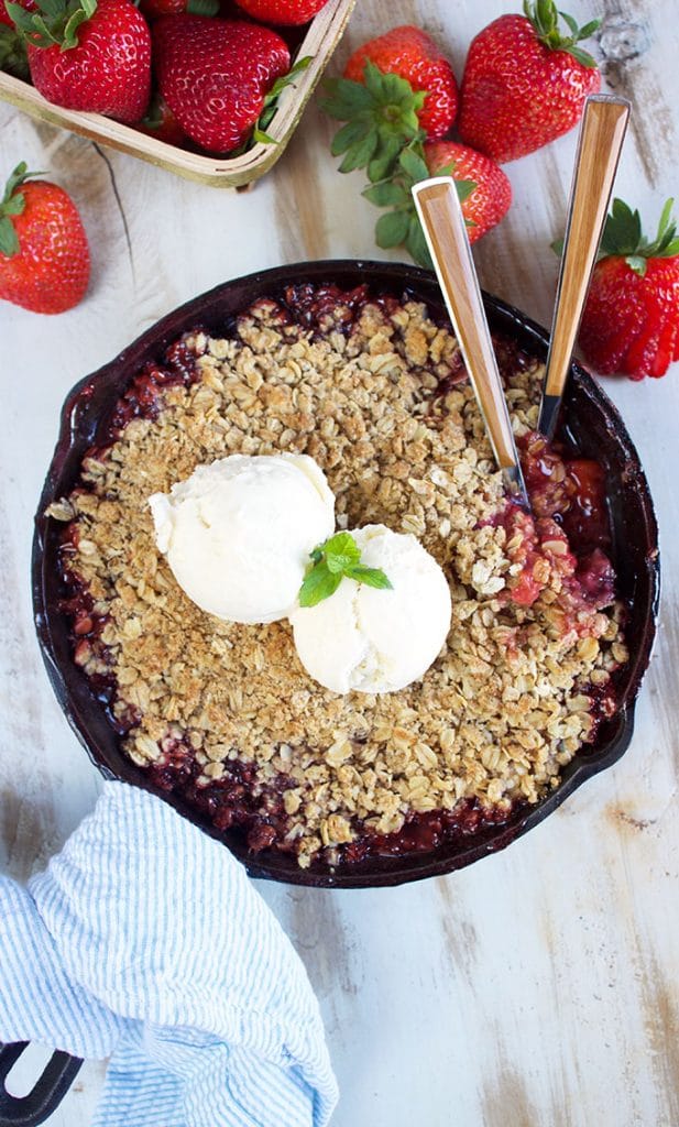 Simple and sweet, the easiest and BEST Strawberry Rhubarb Crisp recipe around. A seasonal classic! | TheSuburbanSoapbox.com