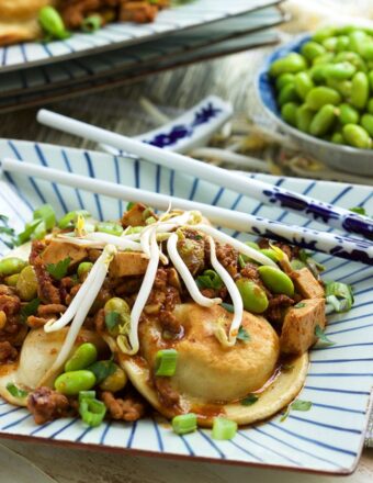 Ready in less than 30 minutes, these Easy Szechuan Style Pierogies are a great weeknight dinner you're entire family will love! | TheSuburbanSoapbox.com