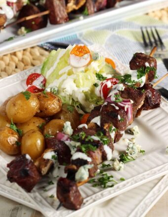 Quick and easy, Grilled Steak and Mushroom Kabobs with Blue Cheese Dressing is the perfect summer dinner for busy weeknights! | TheSuburbanSoapbox.com
