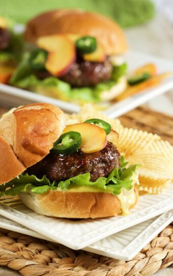 A savory and sweet combo everyone will love, this Peach Glazed Blue Cheese Burger will be the hit of your summer cookout or tailgate! | TheSuburbanSoapbox.com