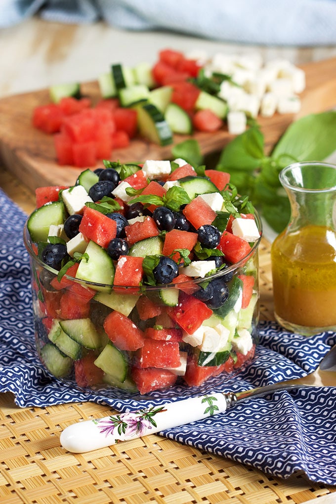 Refreshing and simple, this Watermelon Blueberry Feta Salad with Cucumbers recipe is the perfect summertime side dish! Ready in minutes!! | TheSuburbanSoapbox.com
